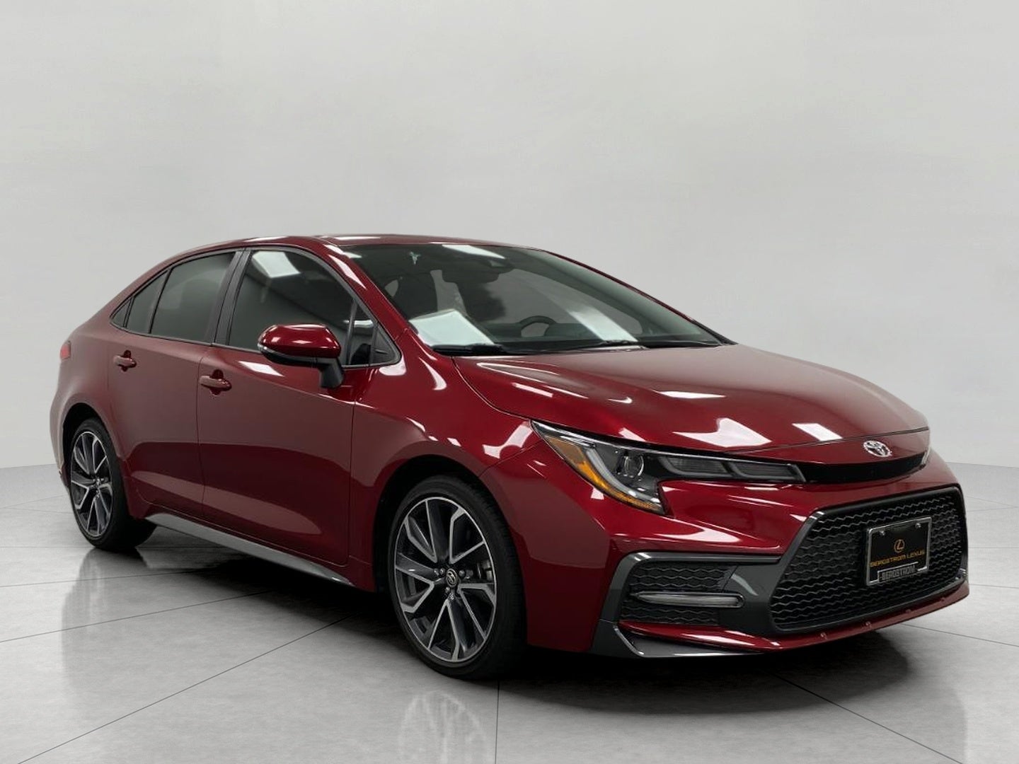 2022 Toyota Corolla SE CVT in Ruby Flare Pearl — front three-quarter view